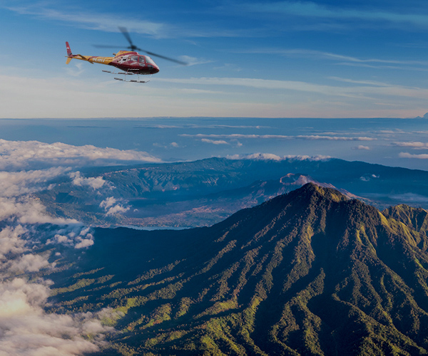 helicopter flying on top of mount batur in Bali
